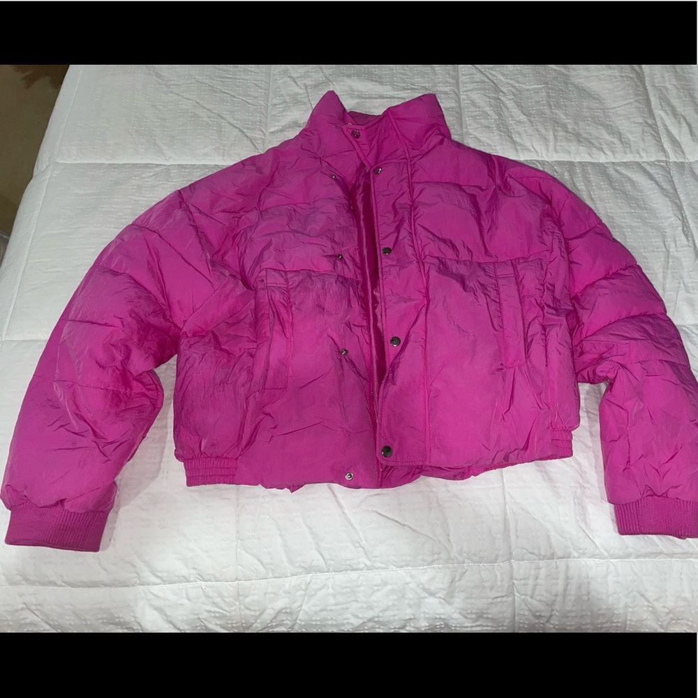 The brand is Free People, bright pink, puffy, and size small. Very comfortable.